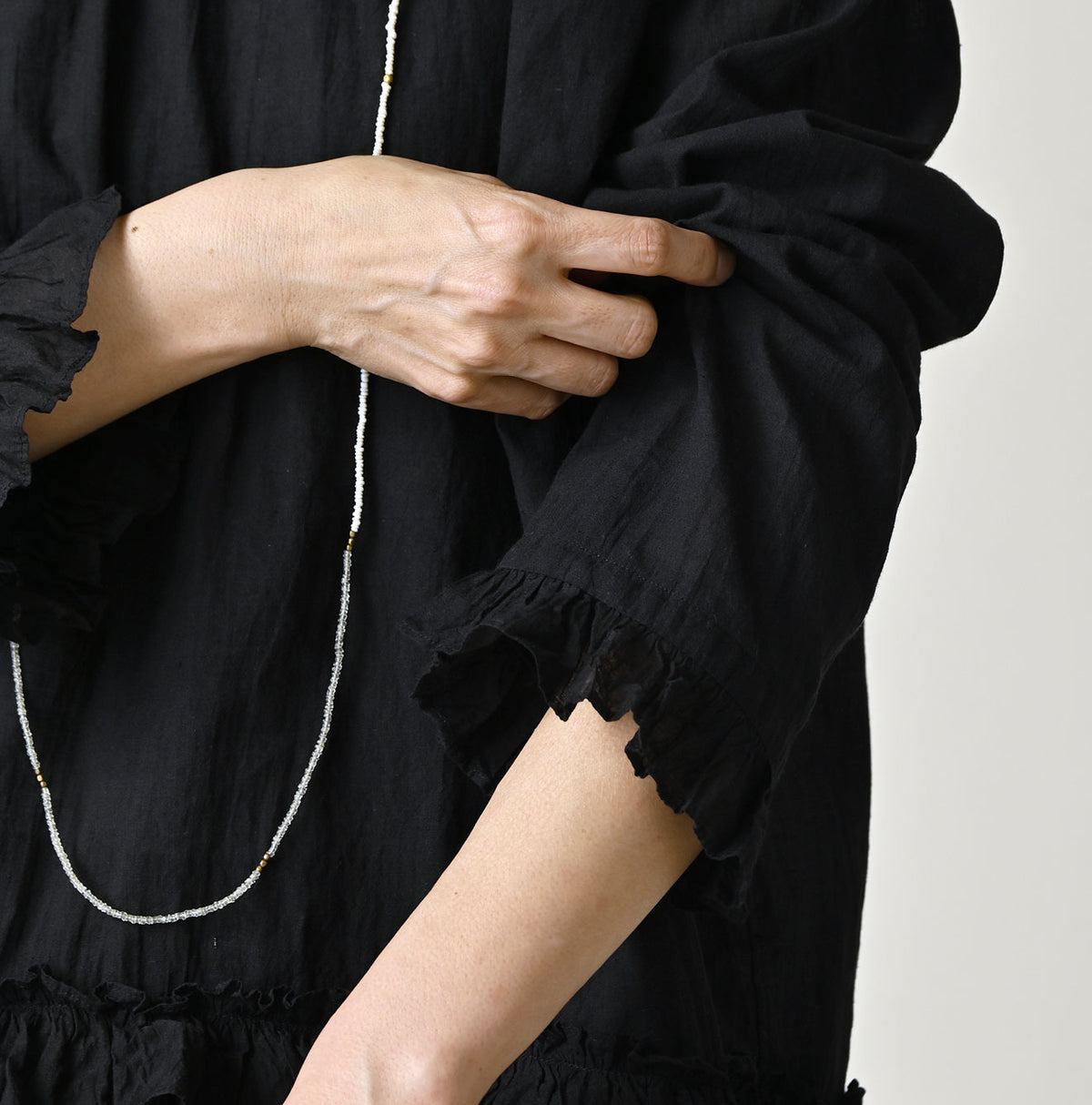Khadi Feather Silk Peplum Frill de T-shirt