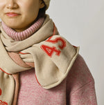 45R Float Jacquard Felted Muffler