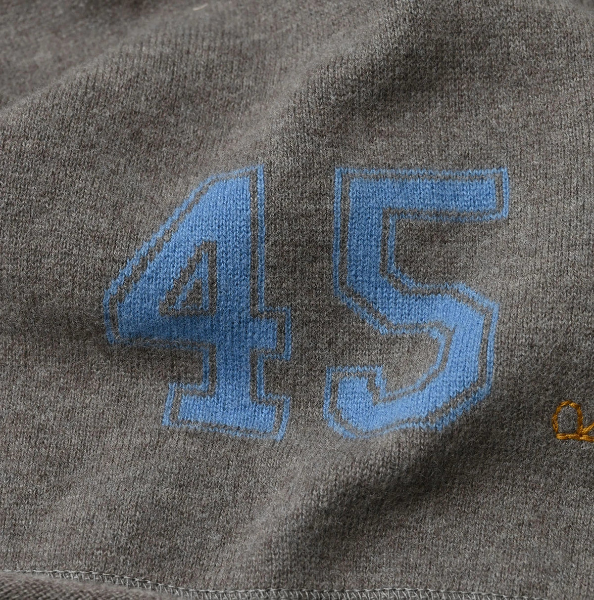 45R Float Jacquard Felted Muffler